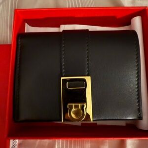 Ferragamo Black Leather Wallet with Gold Accents
